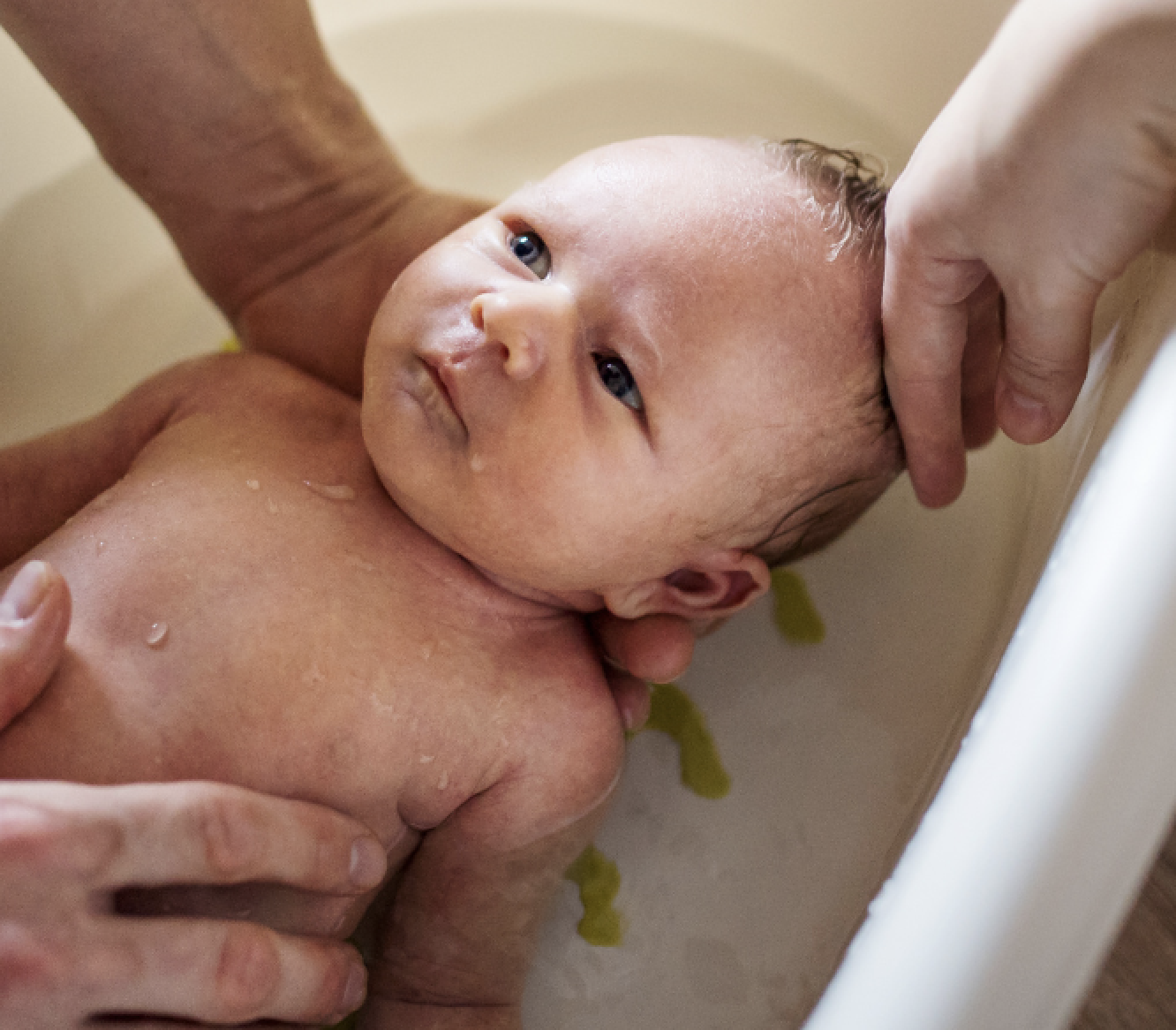 Newborn baby in the bath