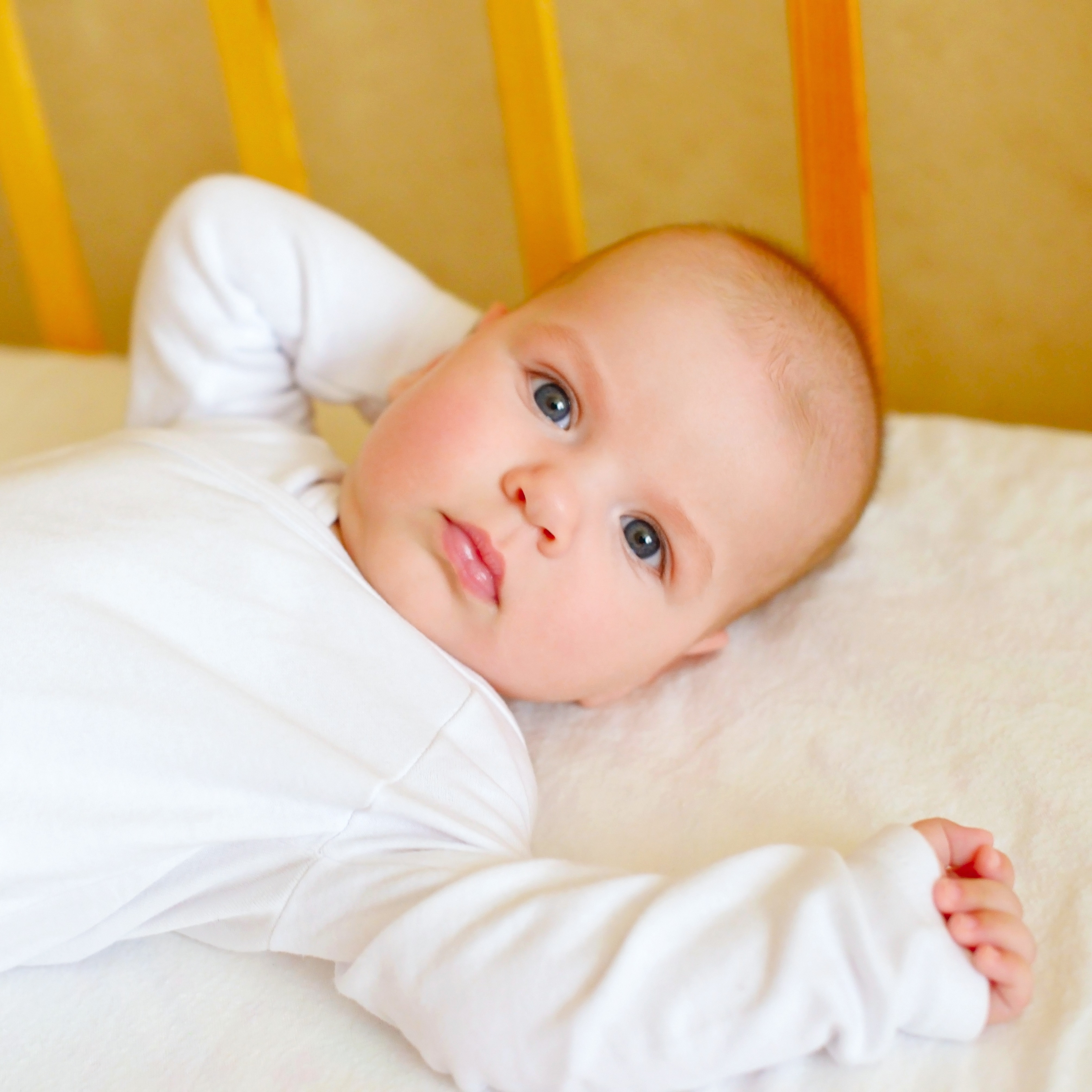 Catnapping baby in crib