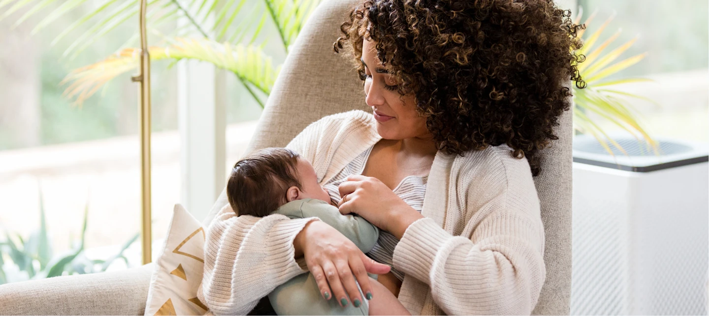 Mom nursing baby | Huckleberry