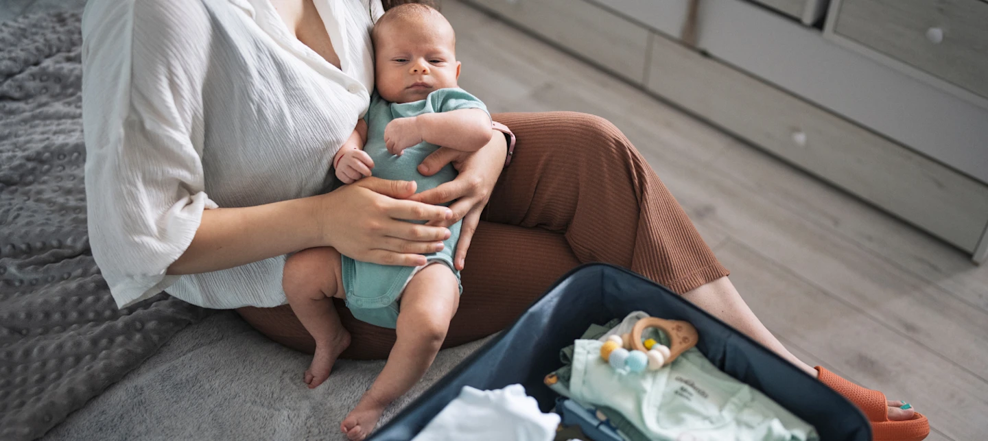 Baby and mom getting ready for a trip | Huckleberry