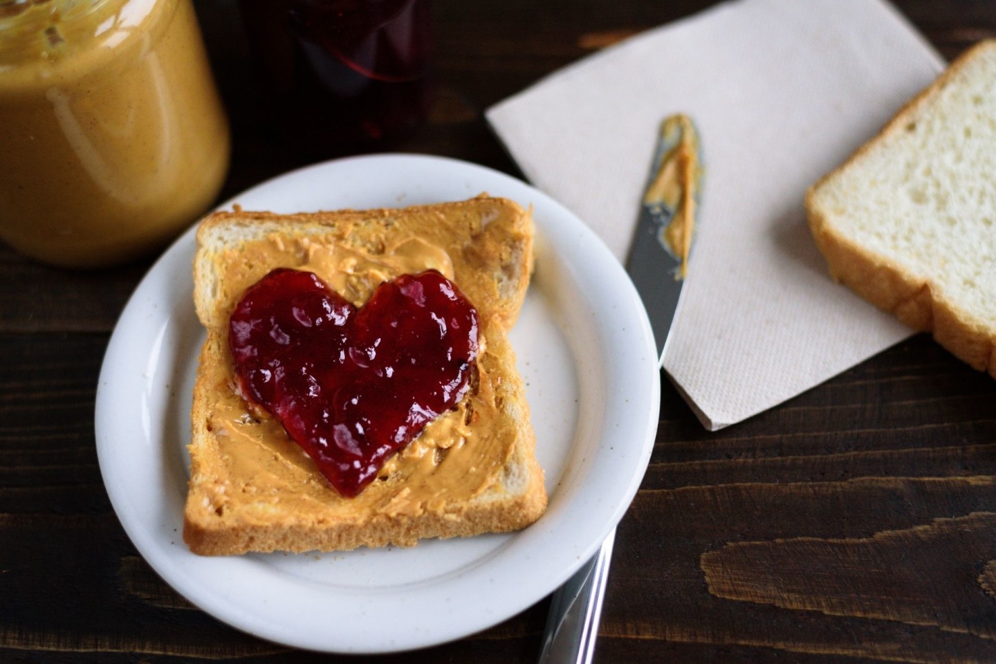Peanut butter on toast with jelly heart on top
