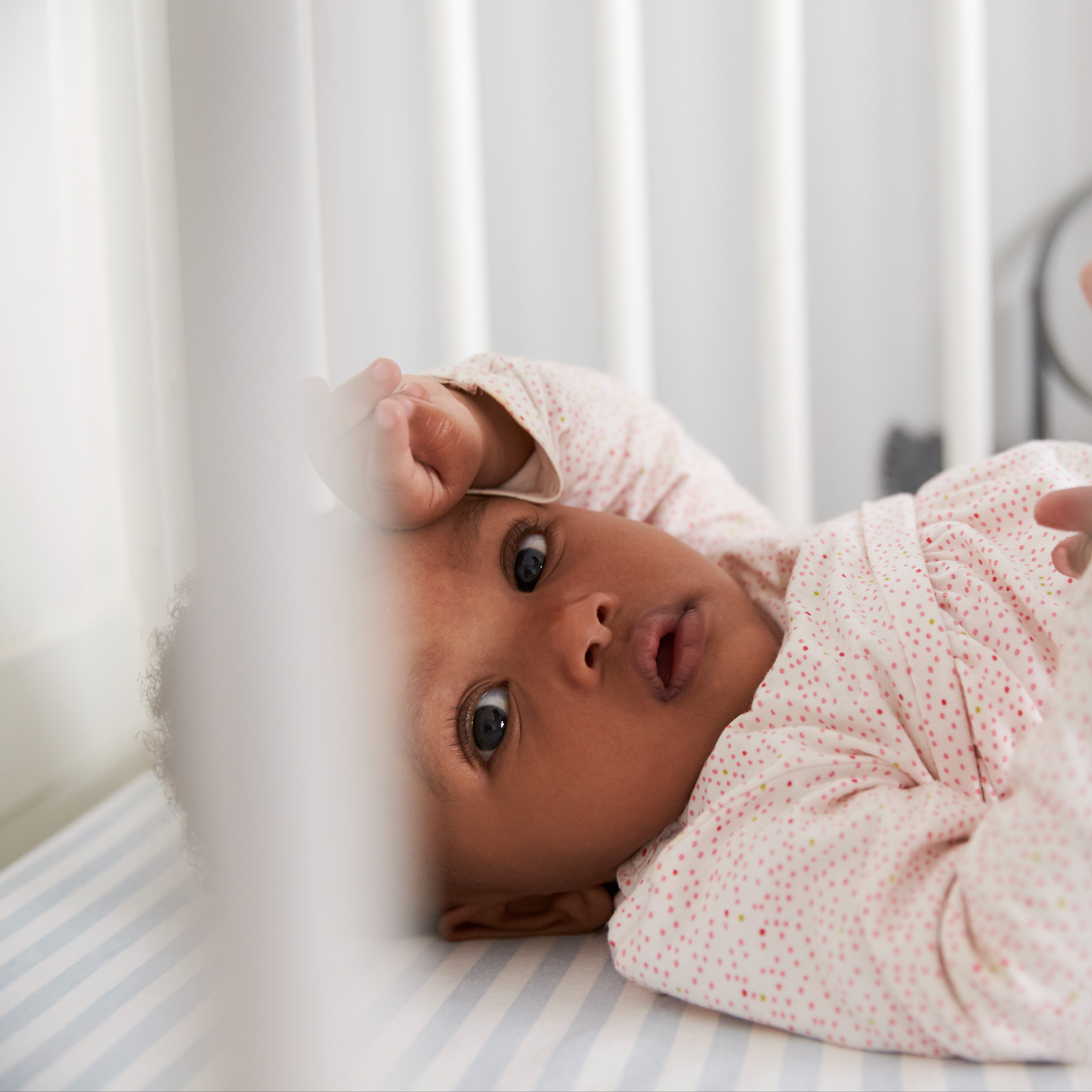 Baby in crib, gentle sleep training