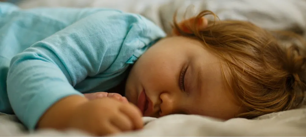 A toddler napping.