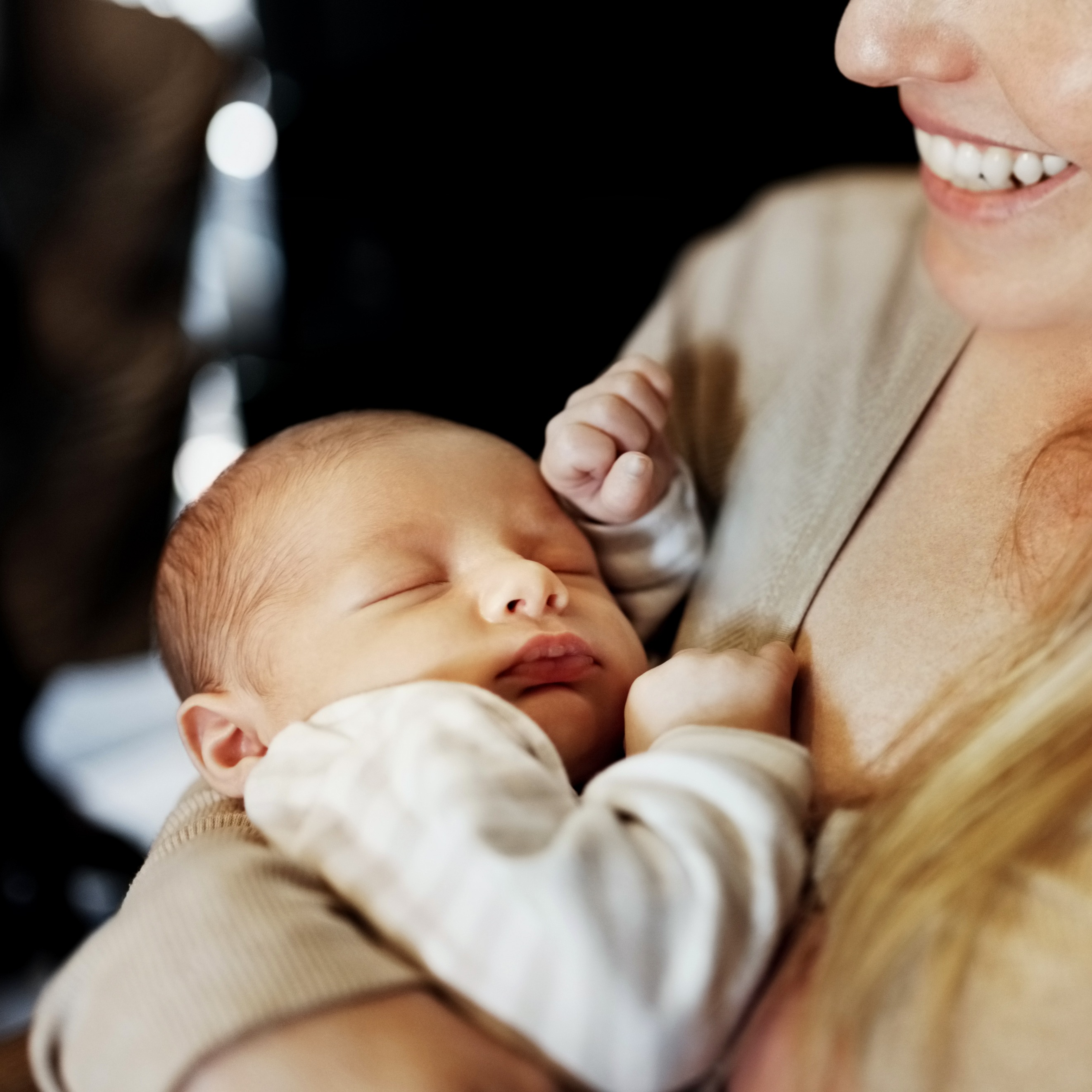 Newborn contact napping with caregiver