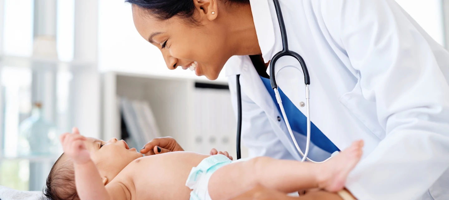 Newborn with pediatrician | Huckleberry