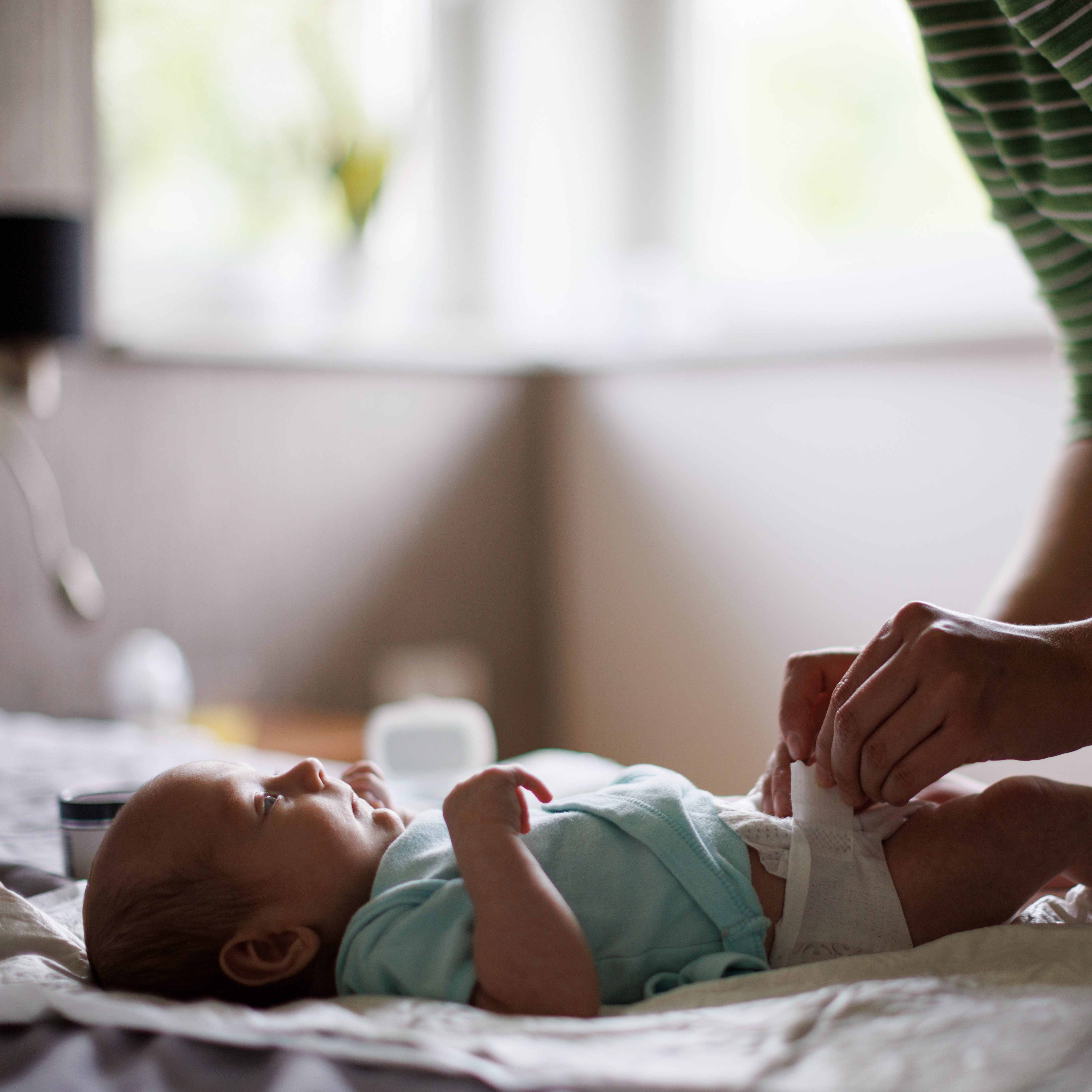 Baby getting diaper changed