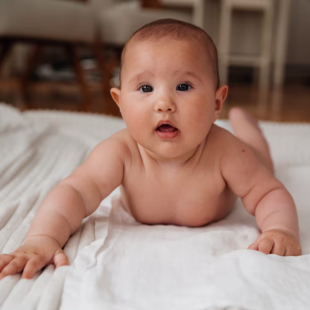 Baby doing tummy time at 4 months