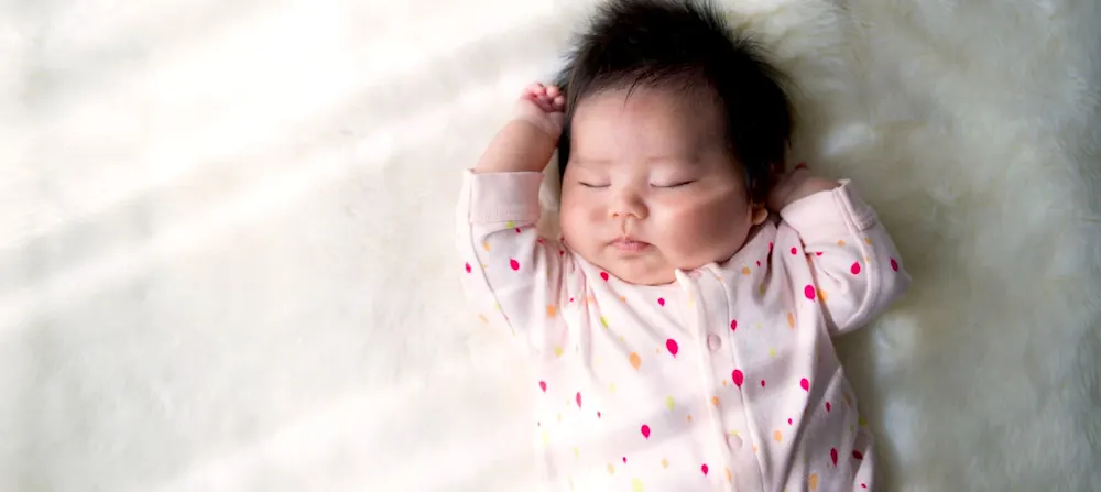 A baby sleeping.