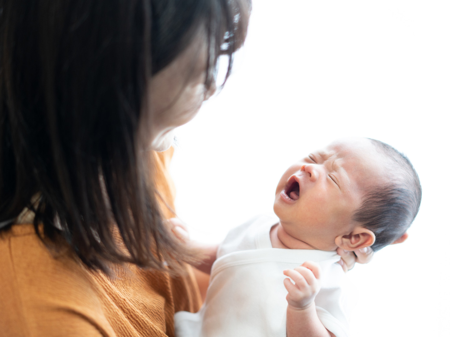 Mom picks up baby that wakes up crying