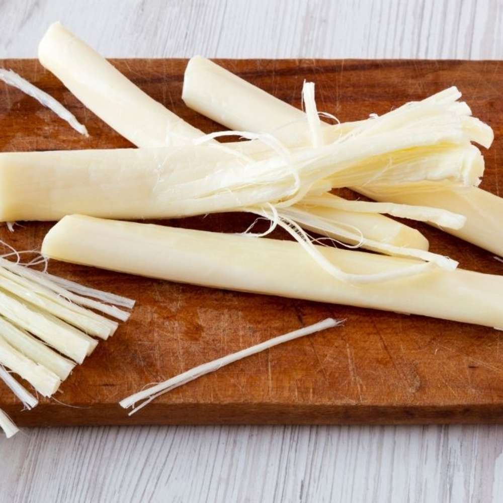 String cheese on cutting board