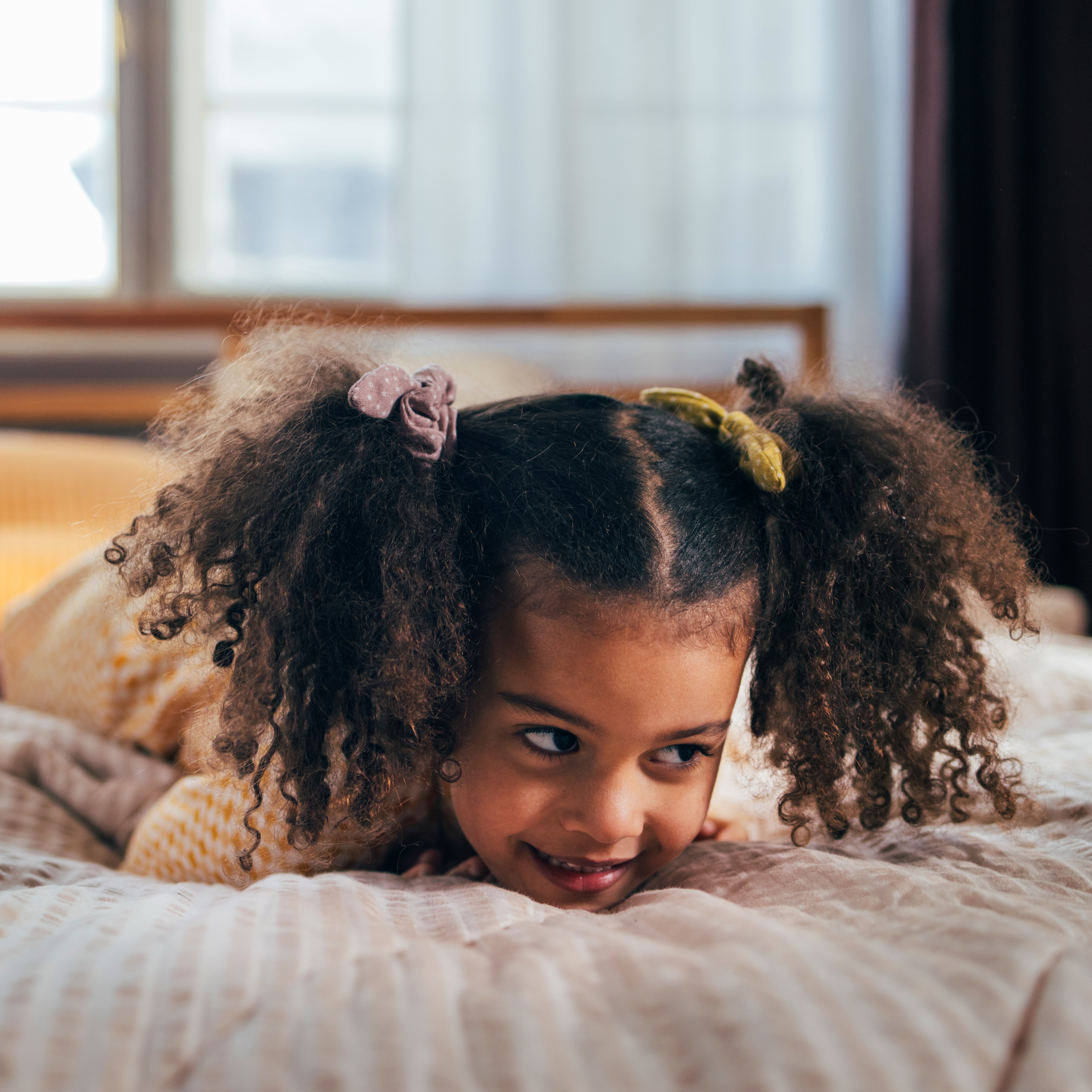 Preschool girl out of bed