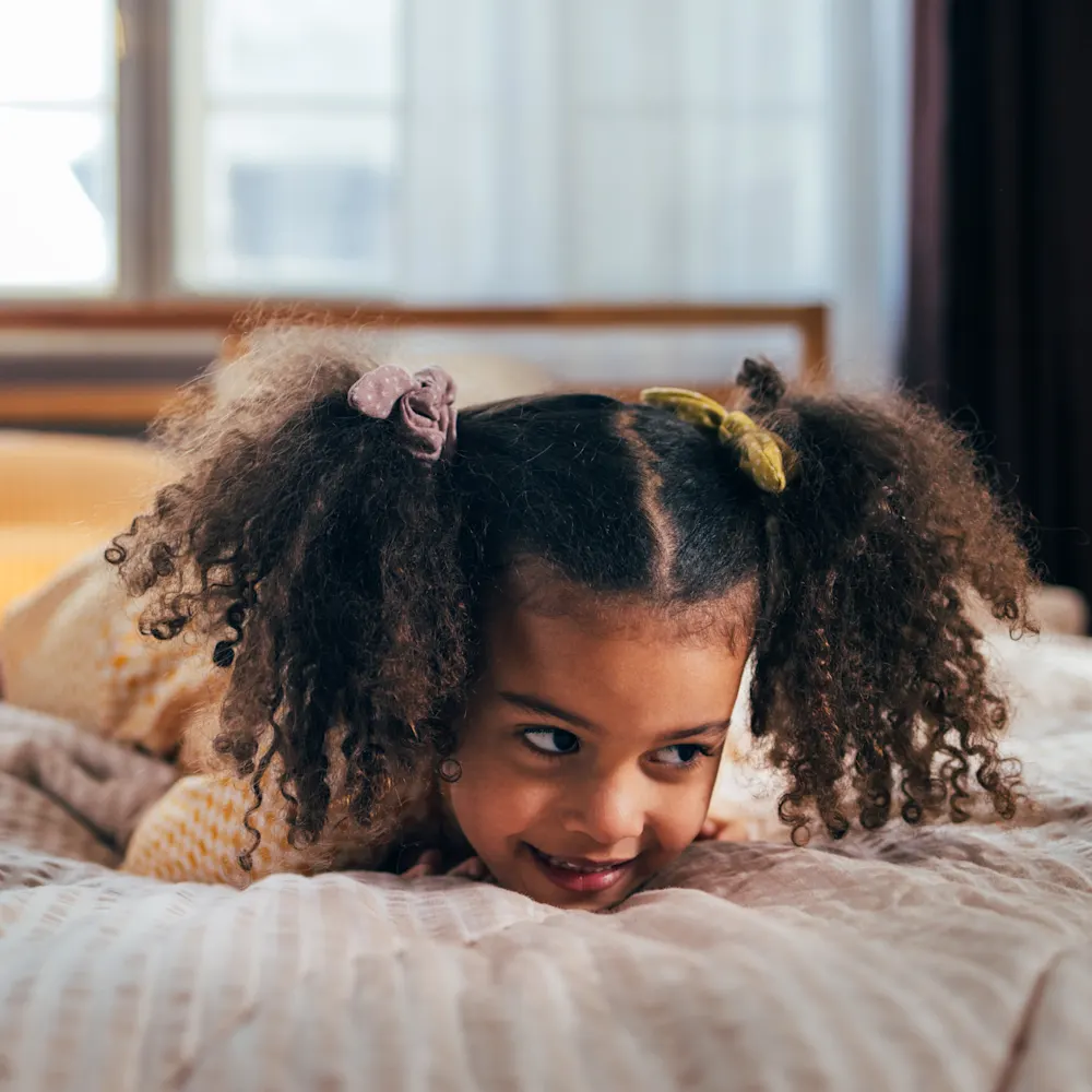 Preschool girl out of bed