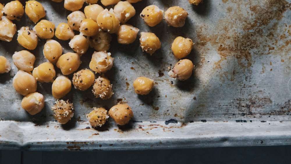 DIY Snacks For Babies and Toddlers: Roasted Chickpeas on a baking sheet