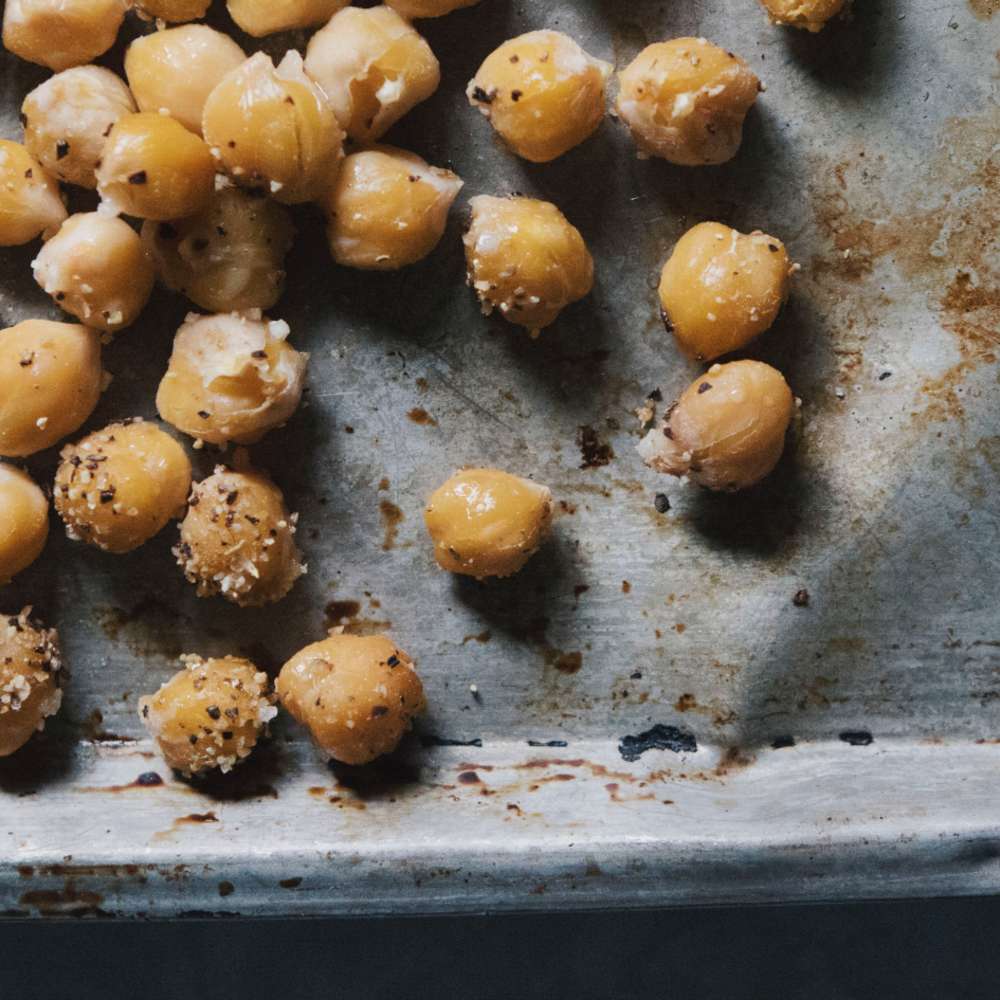 DIY Snacks For Babies and Toddlers: Roasted Chickpeas on a baking sheet