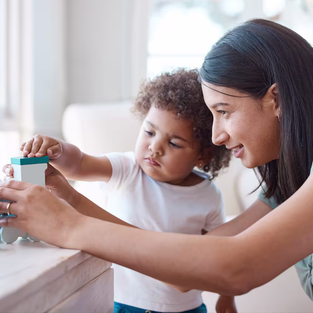 Child and mother playing