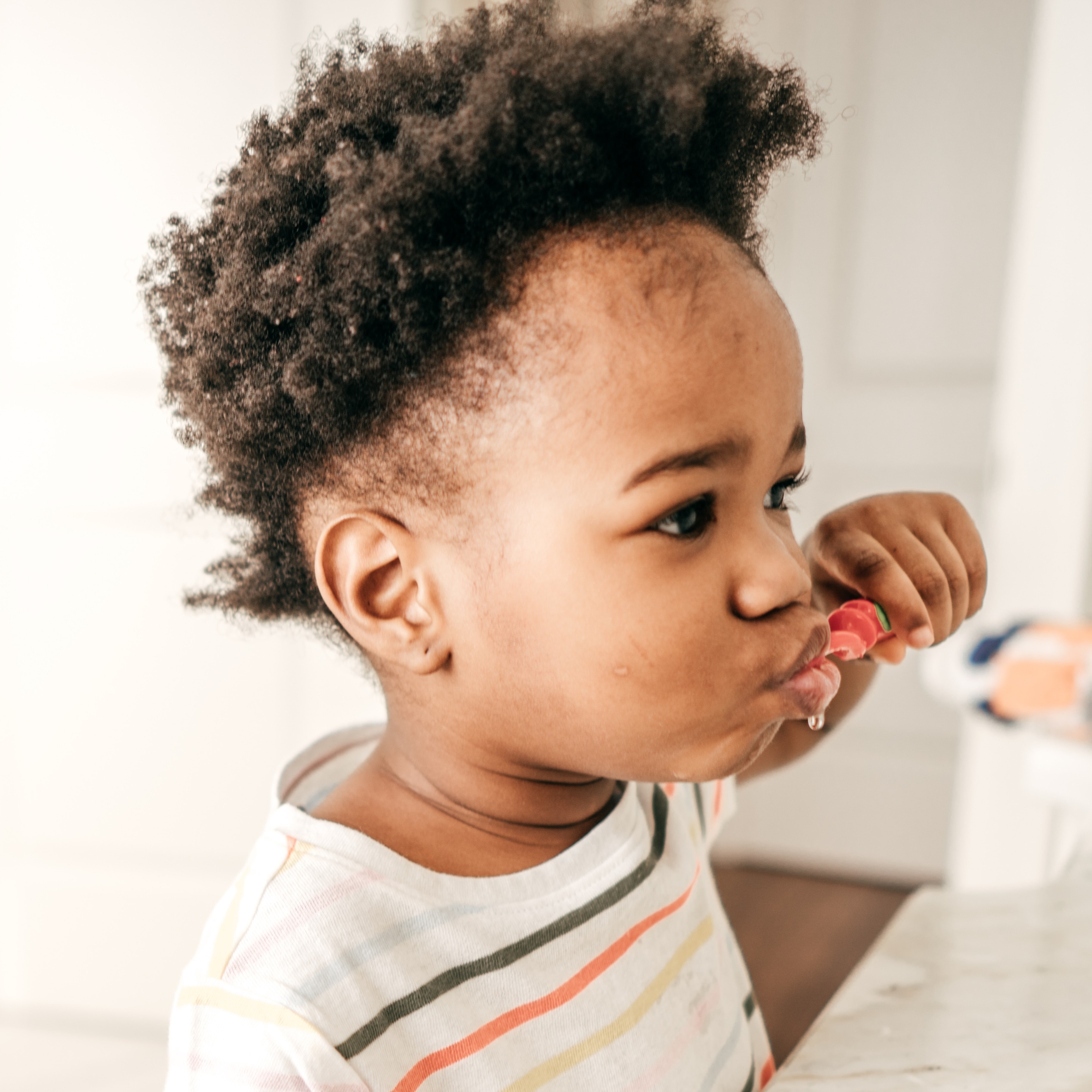 Toddler brushing teeth before bed