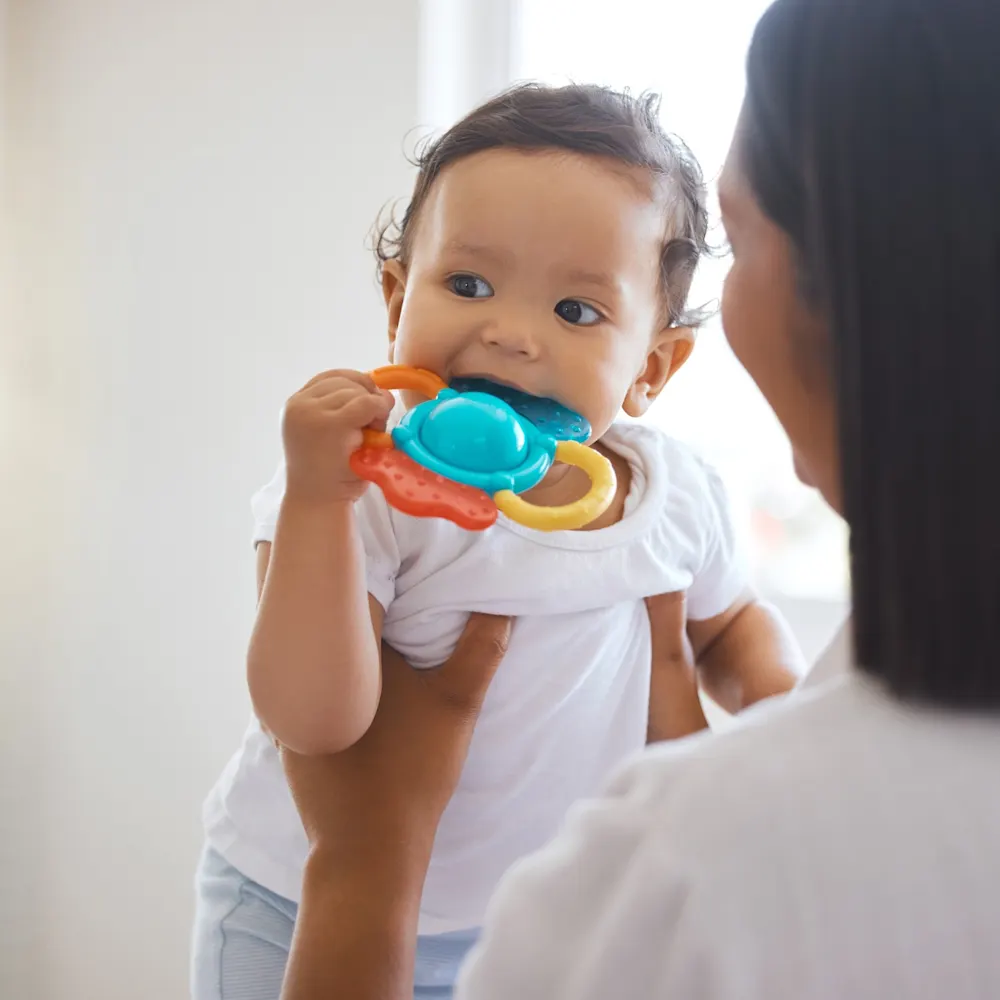 Mother and teething baby