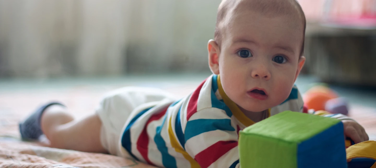 Baby playing after eating, before sleep. | Huckleberry