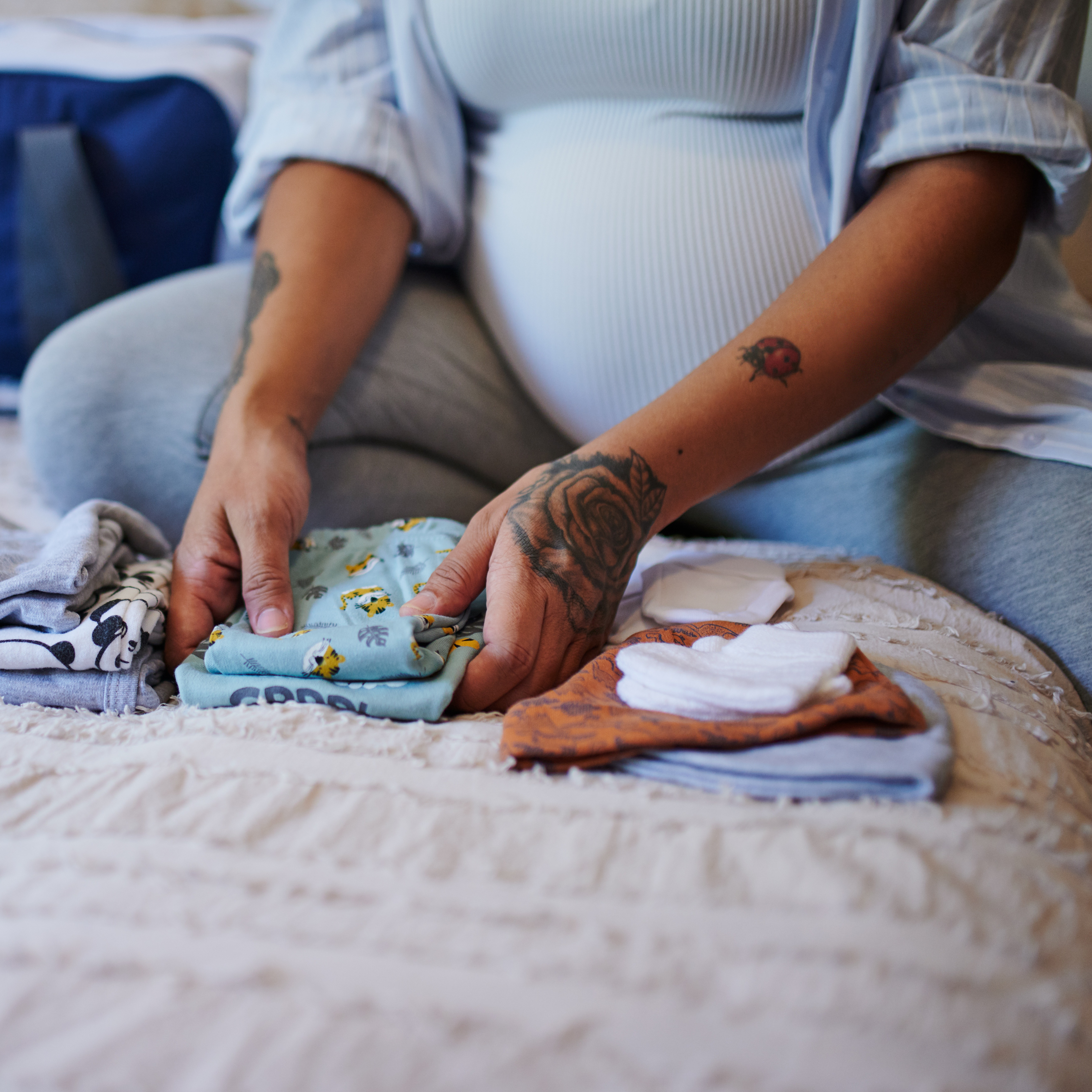 Expecting mom packing hospital bag 