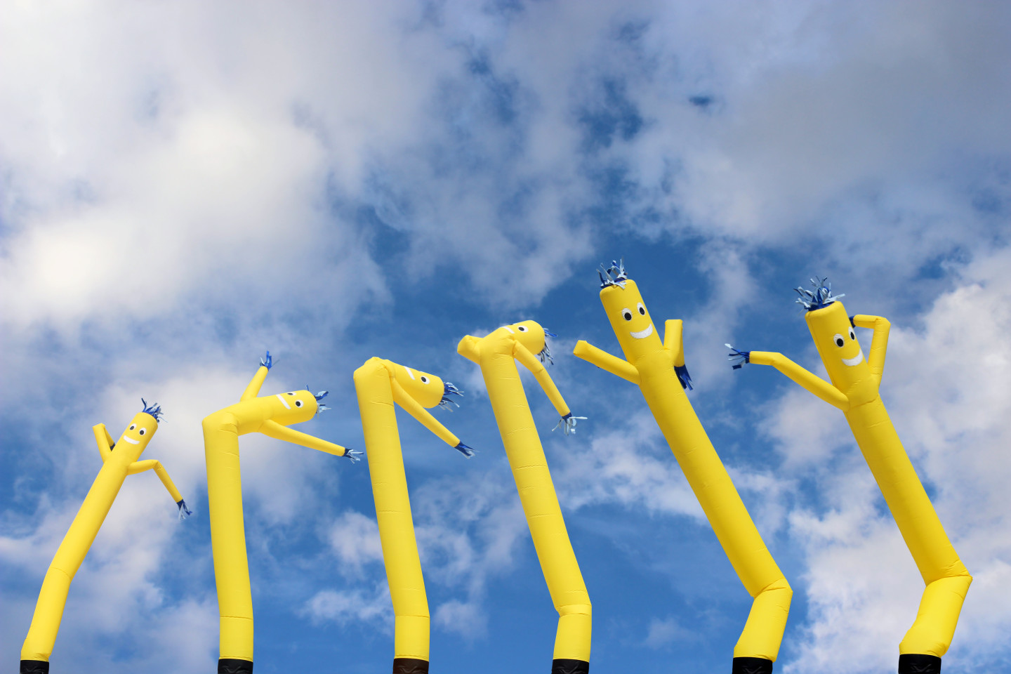 Air dancers at a car dealership.