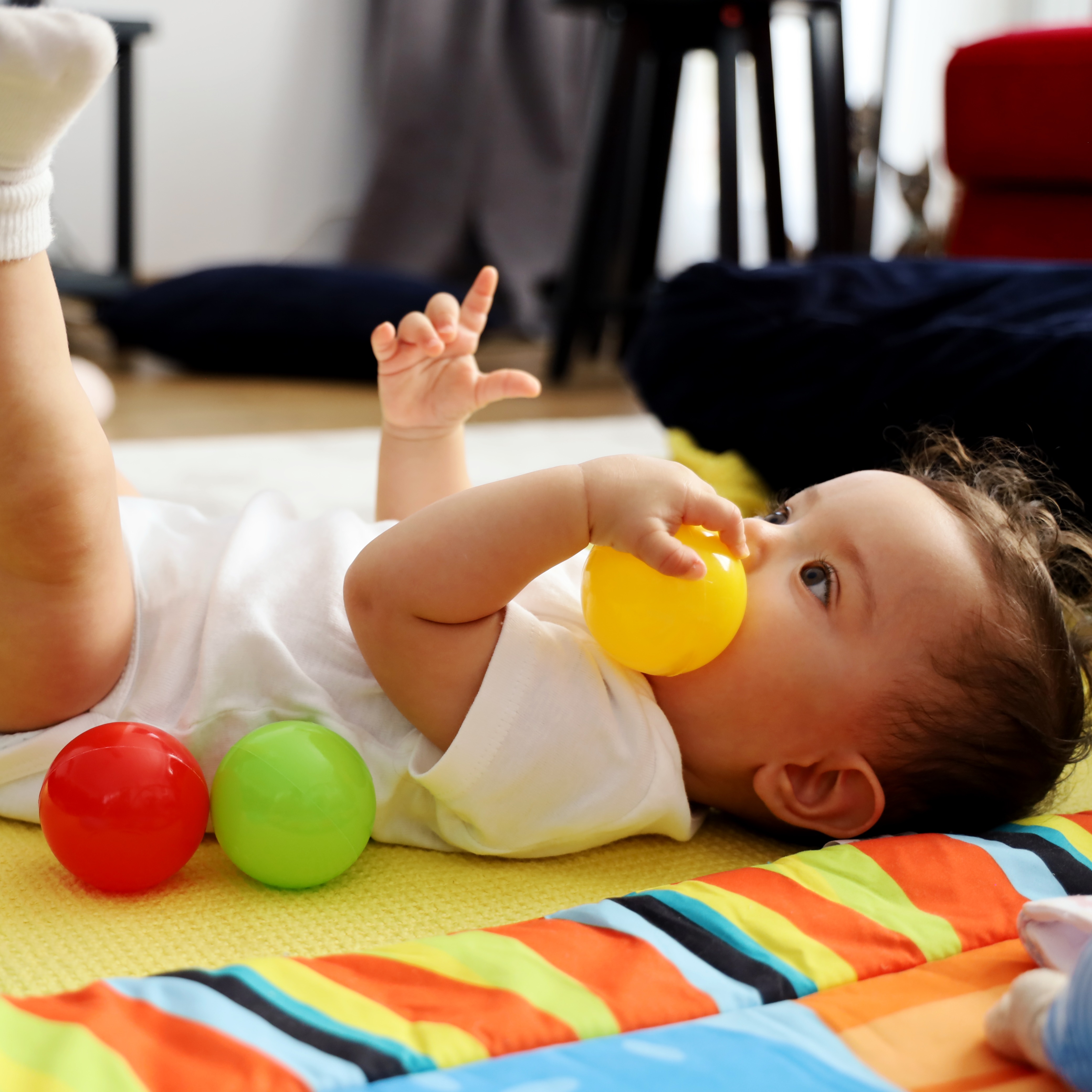 Baby doing floor time play