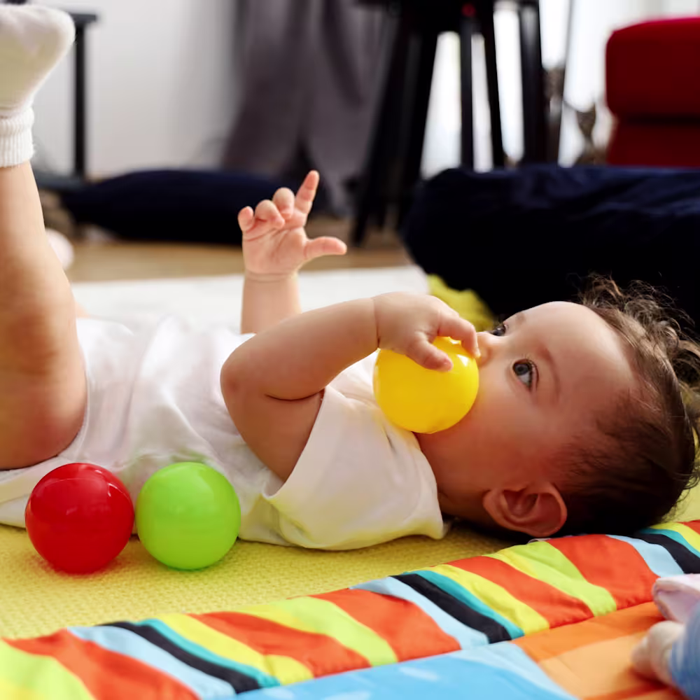 Baby doing floor time play