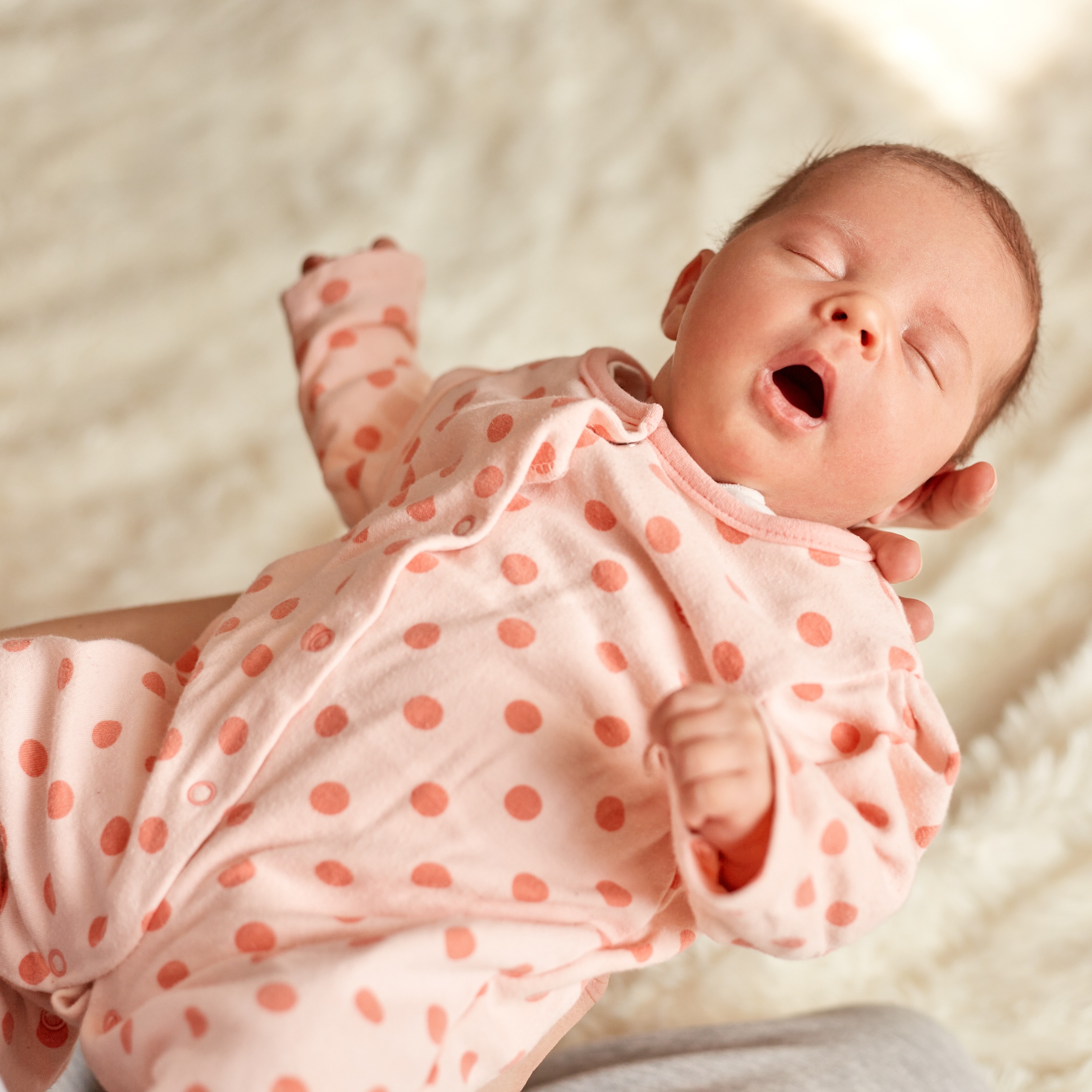 Baby sleeping with open mouth