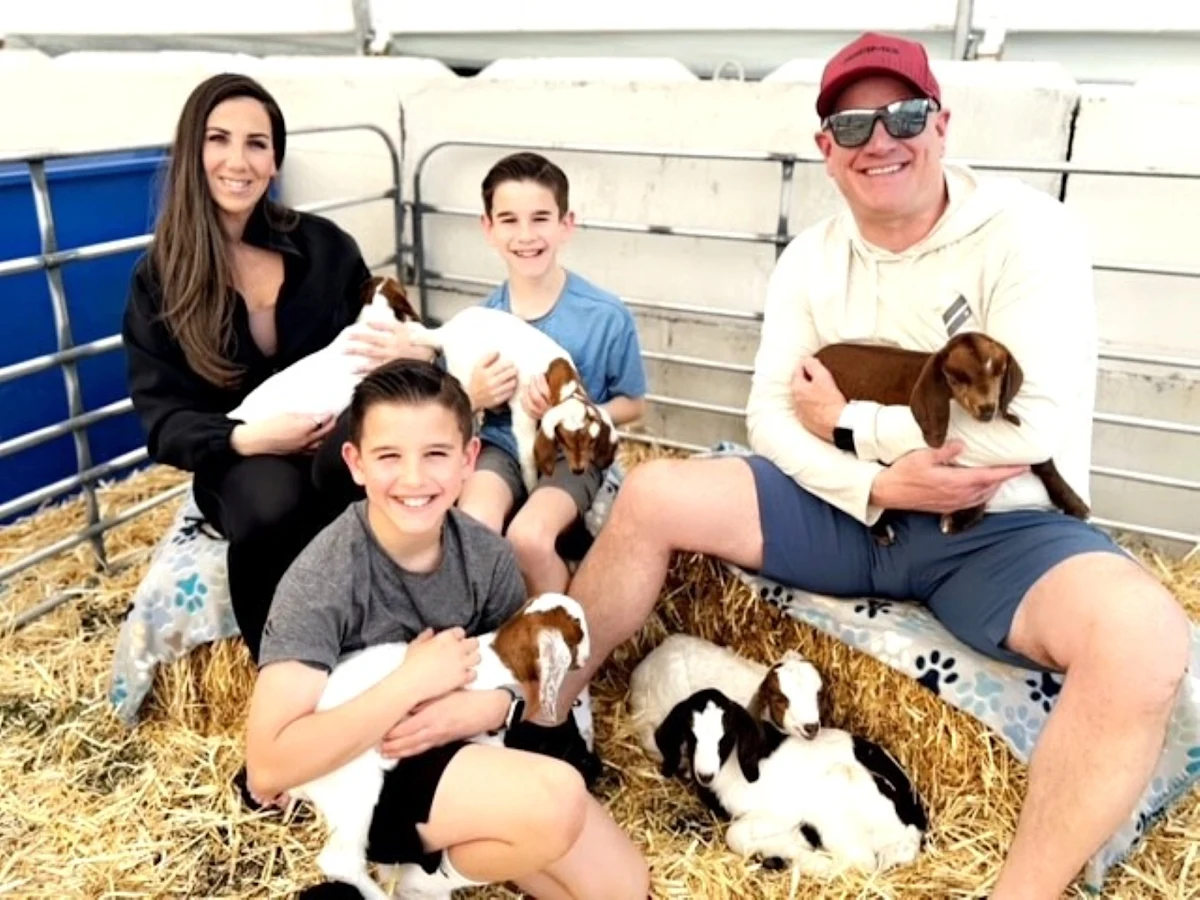 John Templeton and his family visit a petting zoo. John has more energy to enjoy quality time with his family since he began treating his obstructive sleep apnea with Inspire® therapy.