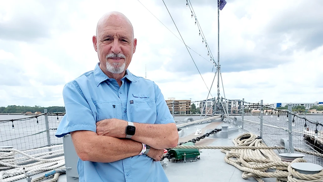Frank Alexander enjoys times on a boat during an overcast day.