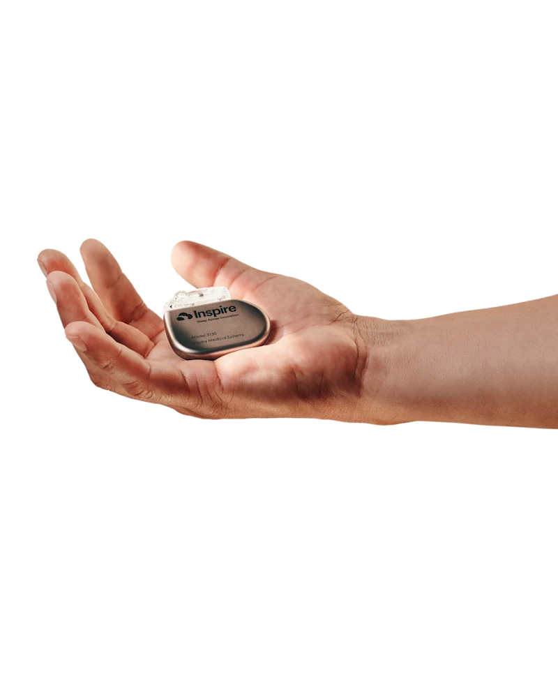 hand holding an Inspire® therapy impant