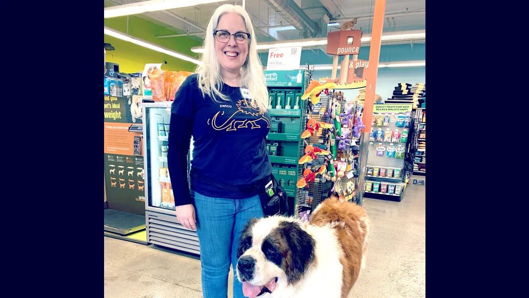 Karen Wolk said she has more energy with Inspire® therapy. Here, she happily works with animals at her job with some of that extra energy.
