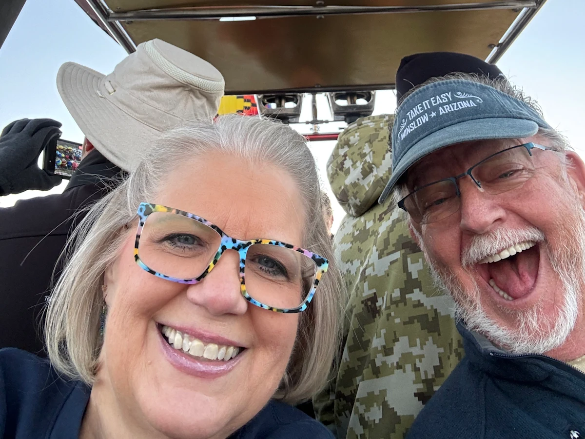 Rex Partlow and his wife have fun during a ride on a powered parachute vehicle. Rex is enjoying life traveling around the United States with his wife in their RV since he began treating his obstructive sleep apnea with Inspire® therapy.