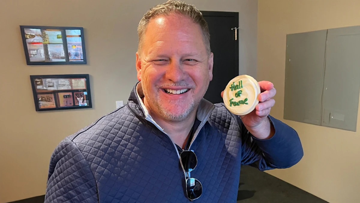 Happy Man showing a cookie