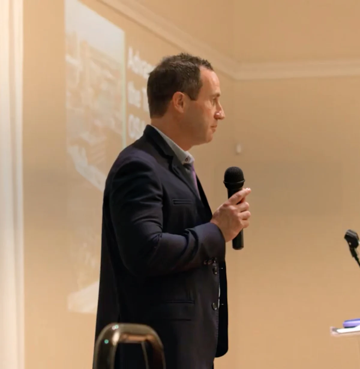 man speaking at event