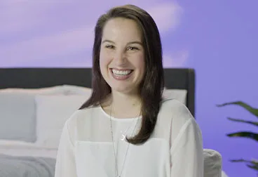 The image features a smiling woman.