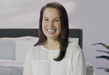 The image features a smiling woman.