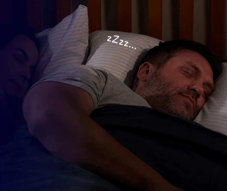 Man sound asleep in bed