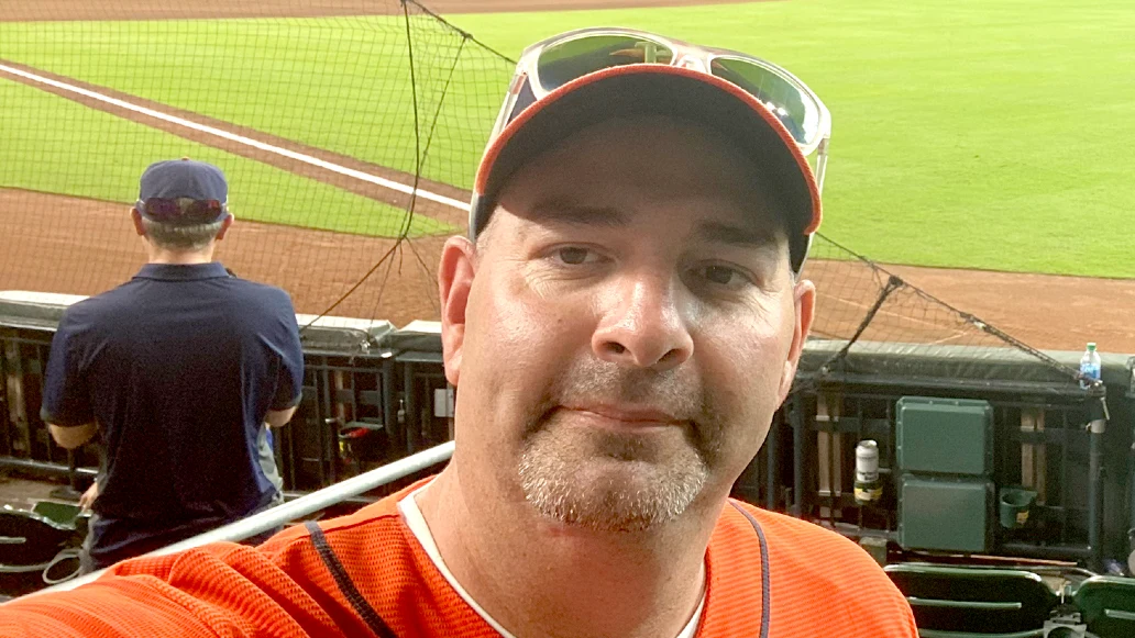 Bryan Foster watches a Houston Astros’ baseball game at Minute Maid Park.
