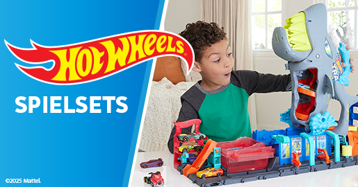 Werbung: Ein Junge spielt mit einem großen Hot Wheels Spielset in Hai-Optik. Text-Banner: Hot Wheels Spielsets.