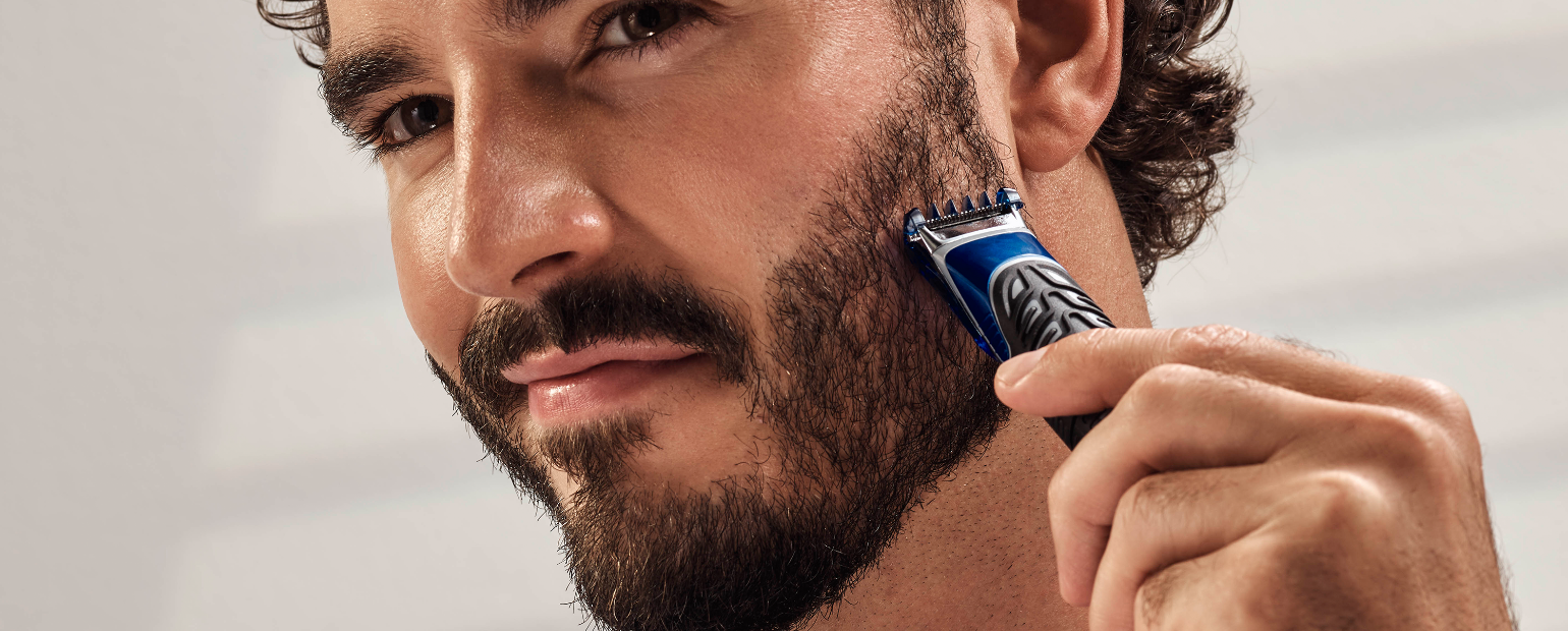 trim beard with comb and razor