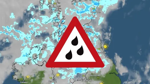 Weather map showing rain in the UK with a warning sign for rainfall