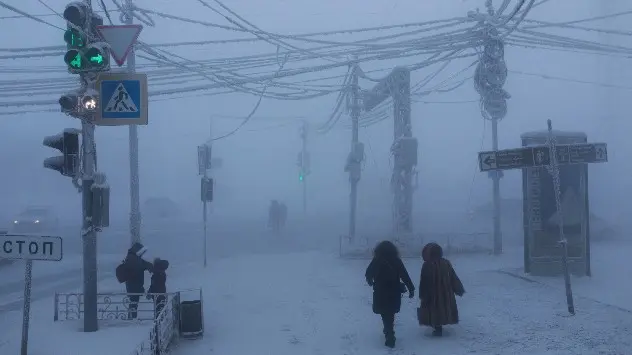 People walking through a frozen street in Yakutsk, eastern Russia.