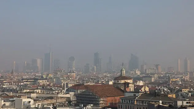 Smog in parts of northern Italy: skyscrapers in Milan rise up in the haze that hangs over the city. 