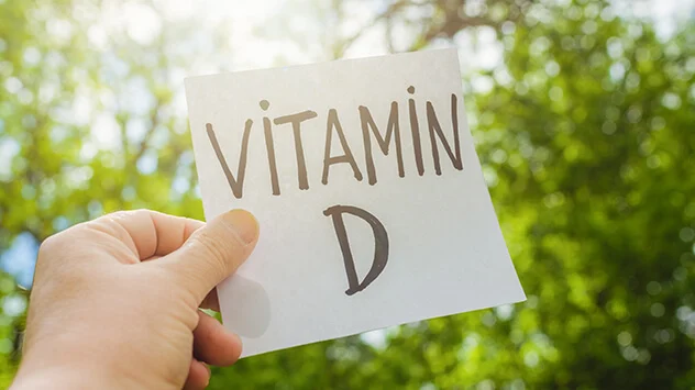 Sonne und Schild mit "Vitamin D"