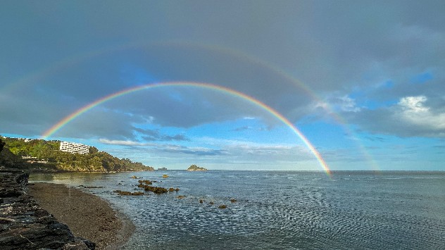 Double rainbow over sea