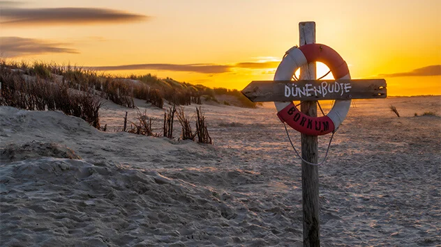 Sonnenuntergang am FKK-Strand