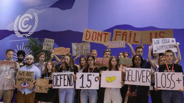 Climate activists protest the negative effects of climate change, at the UN climate summit COP27.