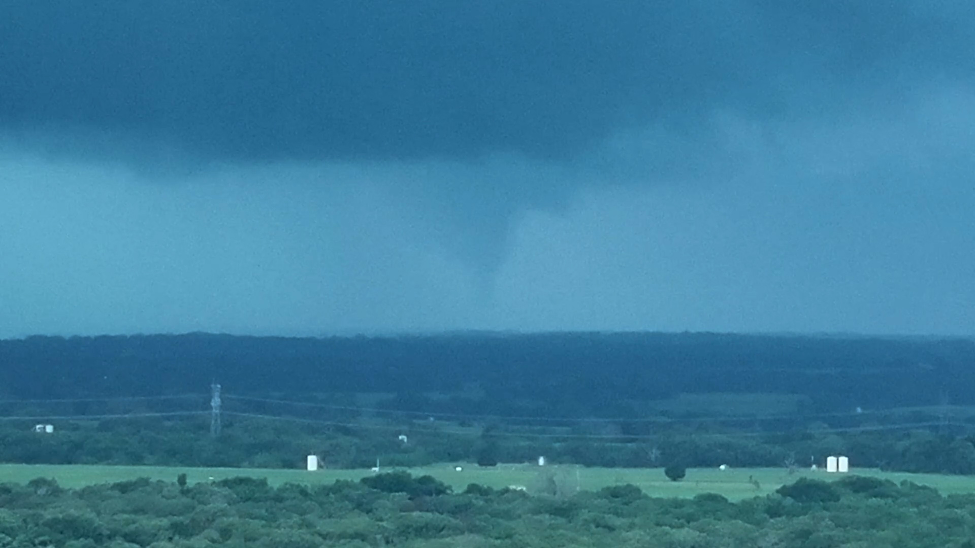 Drone image reveals tornado in the horizon over Groveton, Texas.