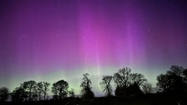 Northern Lights, aurora borealis, shining over Scotland in April 2024.