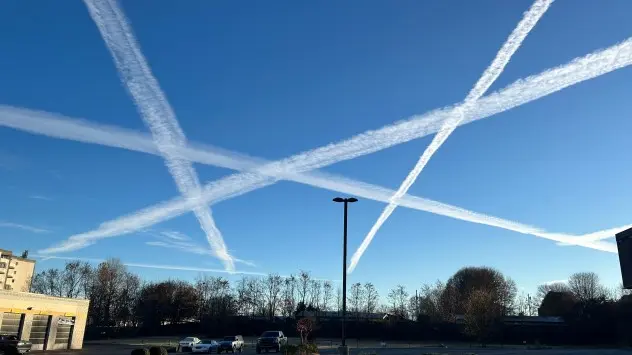 Contrails in blue sky